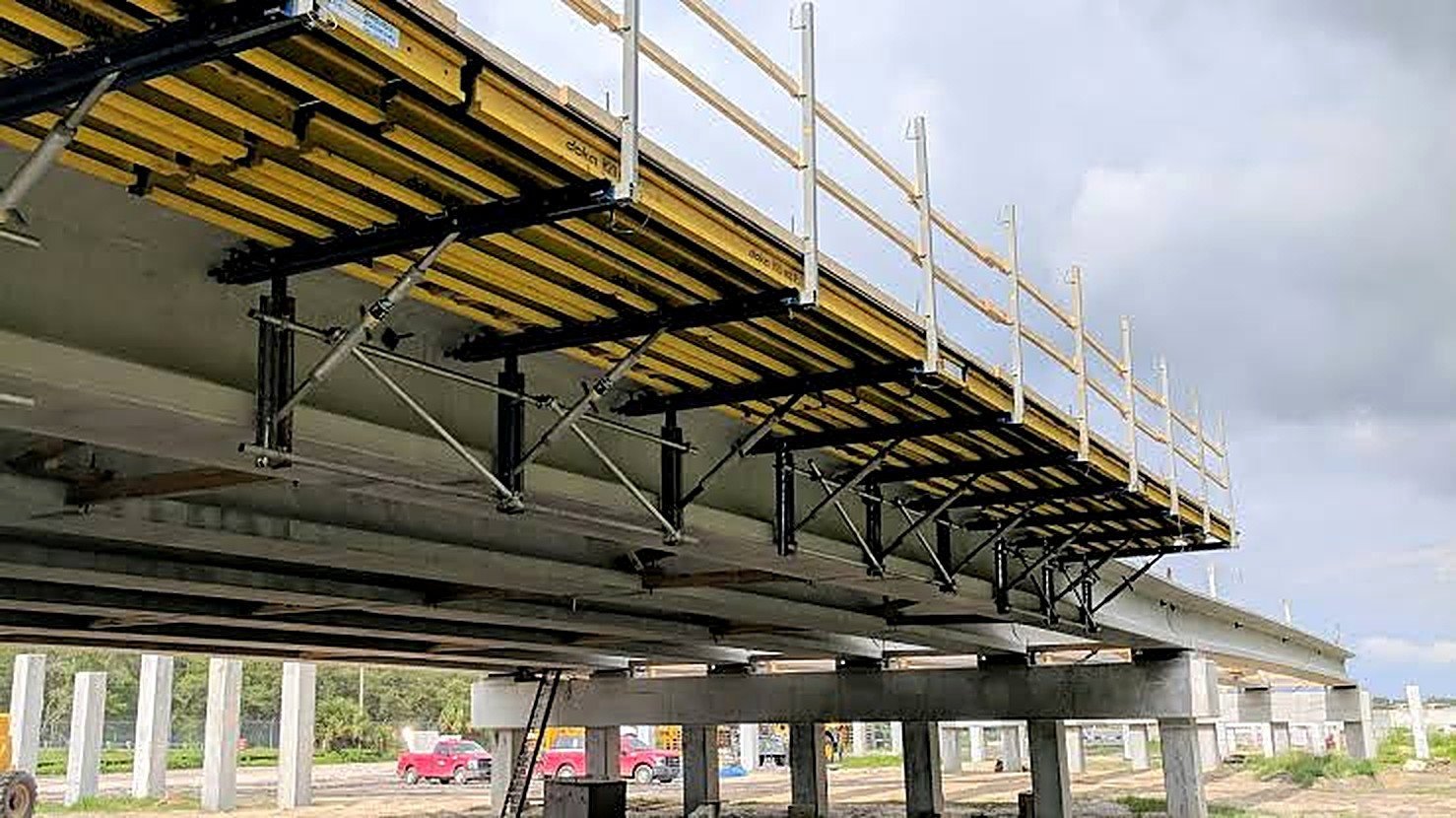 Steel support framing under an elevated roadway