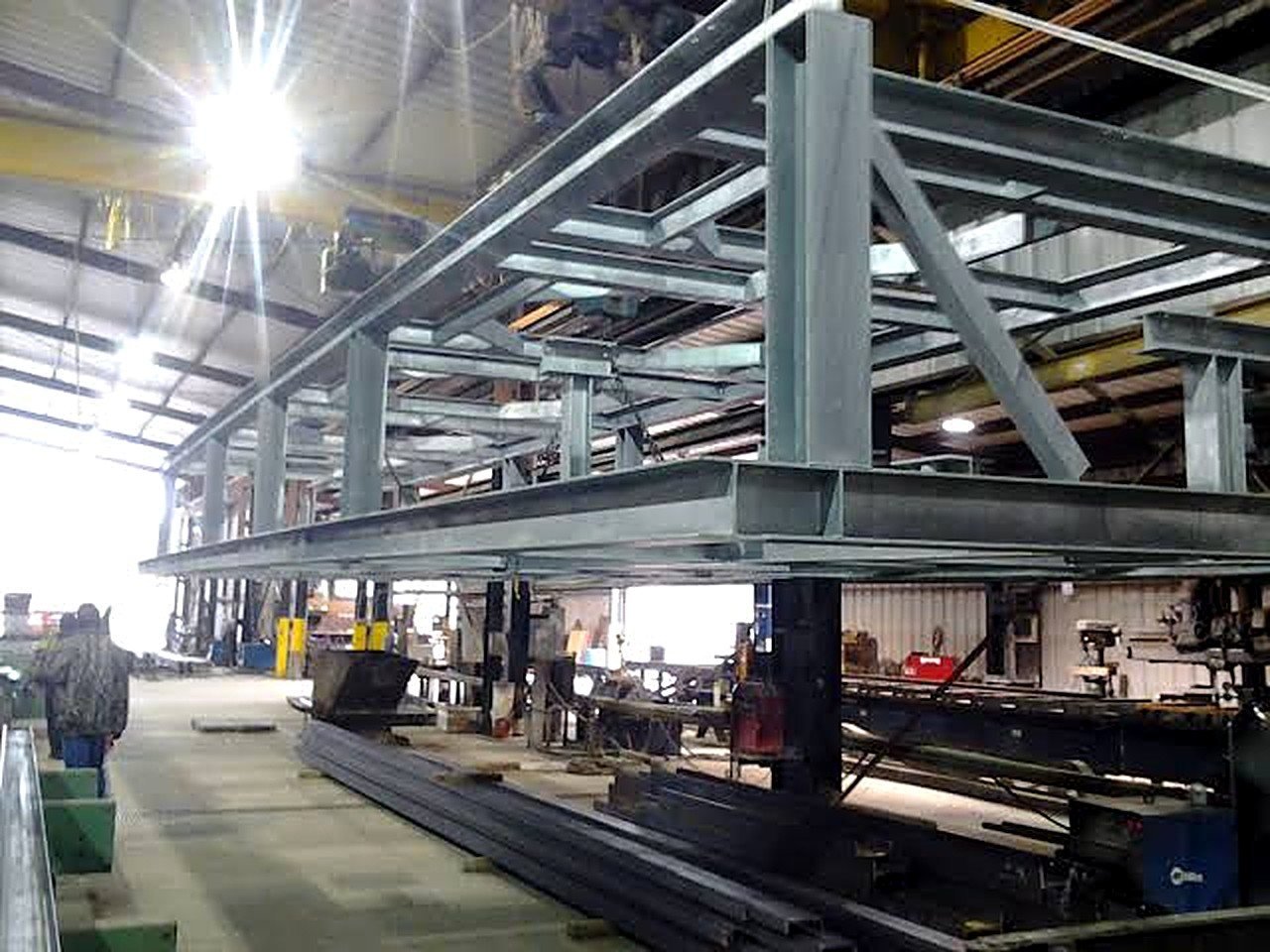 Structural steel framing inside a production facility